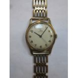 9ct GOLD RECORD WRISTWATCH ON 9ct GOLD STRAP