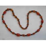 STRAND OF AMBER BEADS