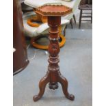 CARVED MAHOGANY TORCHERE STAND ON TRIPOD SUPPORT