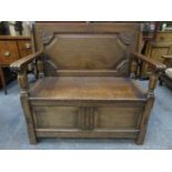 CARVED FRONTED OAK MONK'S BENCH