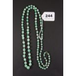 An antique jade bead necklace, L. 54cm.
