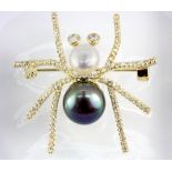 A yellow metal stone, white and black cultured pearl set spider shaped brooch, L. 3.5cm.