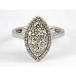 An 18ct white gold diamond set cluster ring, (approx. 1ct overall), (N).