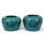 A pair of Chinese turquoise glazed and relief decorated bowls, H. 12cm, Dia. 15cm.