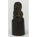 A Chinese carved horn seal, H. 7.5cm.