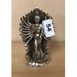 A Tibetan silvered bronze figure of a multi armed goddess. H.13cms