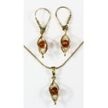 A 925 silver gilt faux amber set necklace and matching pair of earrings.