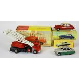 Three Dinky die cast model vehicles.