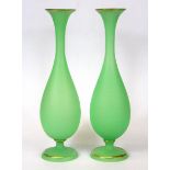 A pair of 19th century green opaline glass vases, H. 30cm.