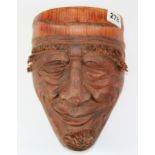An unusual carved bamboo mask, H. 22cm.