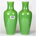 A pair of Chinese lime green crackle glazed vases, H. 26cm, with six character mark to base. Prov.