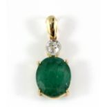 A yellow metal (tested 14ct gold) emerald and diamond set pendant, L. 2.5cm.