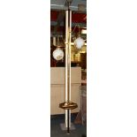A vintage brass adjustable height bar light and shades.