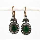 A pair of yellow metal (tested 18ct gold) emerald and diamond set drop earrings, emerald approx. 1.