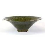 A Chinese Yuan Dynasty style incised green glazed red clay pottery bowl, Dia. 27cm, H. 9cm.