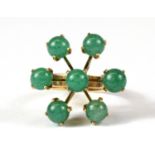 A Scandinavian 14ct yellow gold jade set ring, (L).