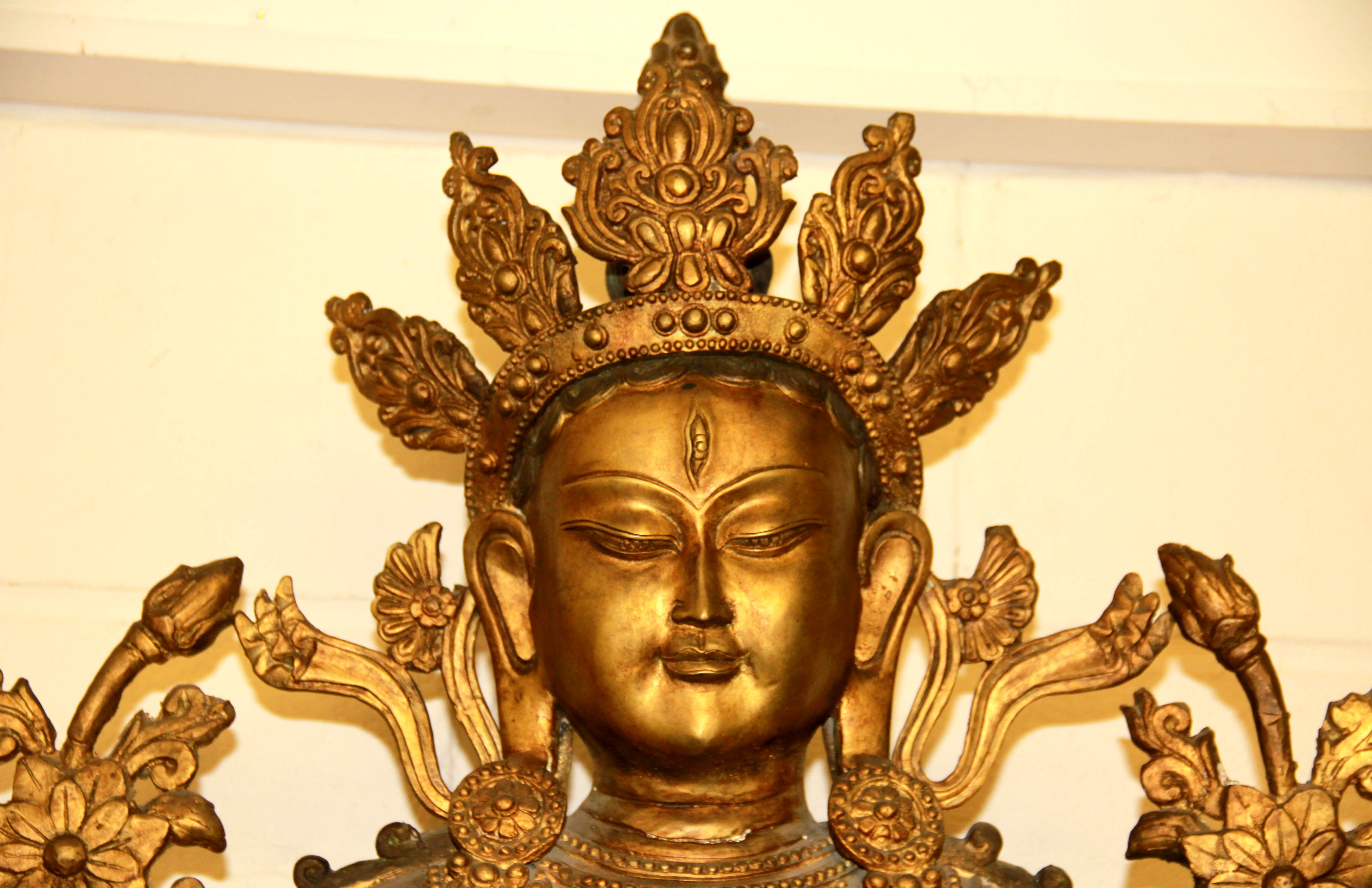 A large Tibetan temple size gilt bronze figure of a seated Bodhisattva, H. 100cm. - Image 2 of 2