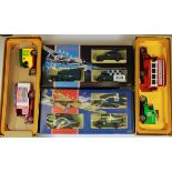 Two Corgi advertising boxes of model vehicles and two Dambusters anniversary sets.