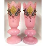 A pair of 19thC pink opaline glass vases hand painted and decorated with gilt relief acorns. H.