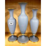 A trio of 19thC blue opaline glass vases with gilt decoration. Tallest 42cms.