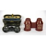 A pair of red Bakelite court glasses from Temple Chambers London with a pair of leather cased