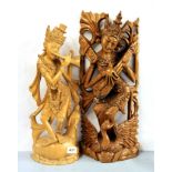 Two Indonesian carved hardwood figures of musicians, tallest H. 51cm.