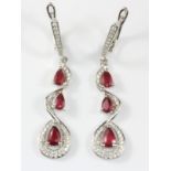 A pair of 925 silver ruby and white stone set drop earrings, L. 4.5cm.
