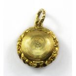 A Georgian yellow metal (tested 15ct gold) portrait pendant, L. 3cm.