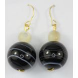 A pair of yellow metal banded agate set drop earrings, L. 3.5cm.