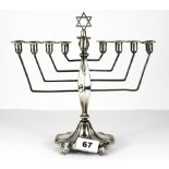 Judaic interest. A hallmarked silver menorah, H. 24cm Weight. approximately 275g.