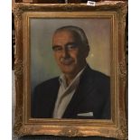 A gilt framed oil on canvas portrait of a gentleman, framed size. 55 x 65cm.