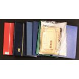 Six mixed stamp albums and a quantity of stamped envelopes.