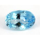 An unmounted 36.71ct oval cut Swiss blue topaz, clarity VVS, 24 x 16 x 12mm.