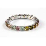 A 925 silver mixed coloured tourmaline set full eternity ring, (O).