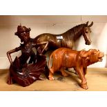 An Indonesian carved hardwood horse, water buffalo and dancer, horse H. 30cm.