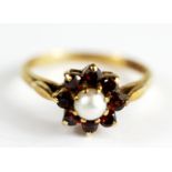 A 9ct yellow gold pearl and garnet set cluster ring, (N.5).