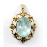 A 9ct yellow gold pendant set with an oval cut aquamarine, L. 4cm.