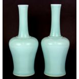 A pair of fine Chinese celadon glazed bottle vases, H. 24cm.
