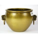 A Chinese gilt cast bronze censer with lion ring handles, W. 22cm H. 14cm.