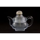 An unusual Chinese carved rock crystal teapot shaped snuff bottle, H. 6cm.