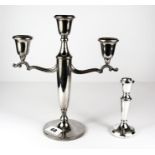 A hallmarked silver three branch candelabrum, H. 25cm together with a single hallmarked silver