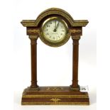 An early 20th Century gilt mounted portico clock, H. 22cm.