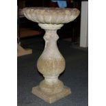 A vintage concrete garden bird bath, H. 60cm.