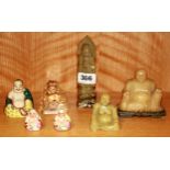 A group of mid 20th Century porcelain and other Buddha figures, tallest H. 14cm.