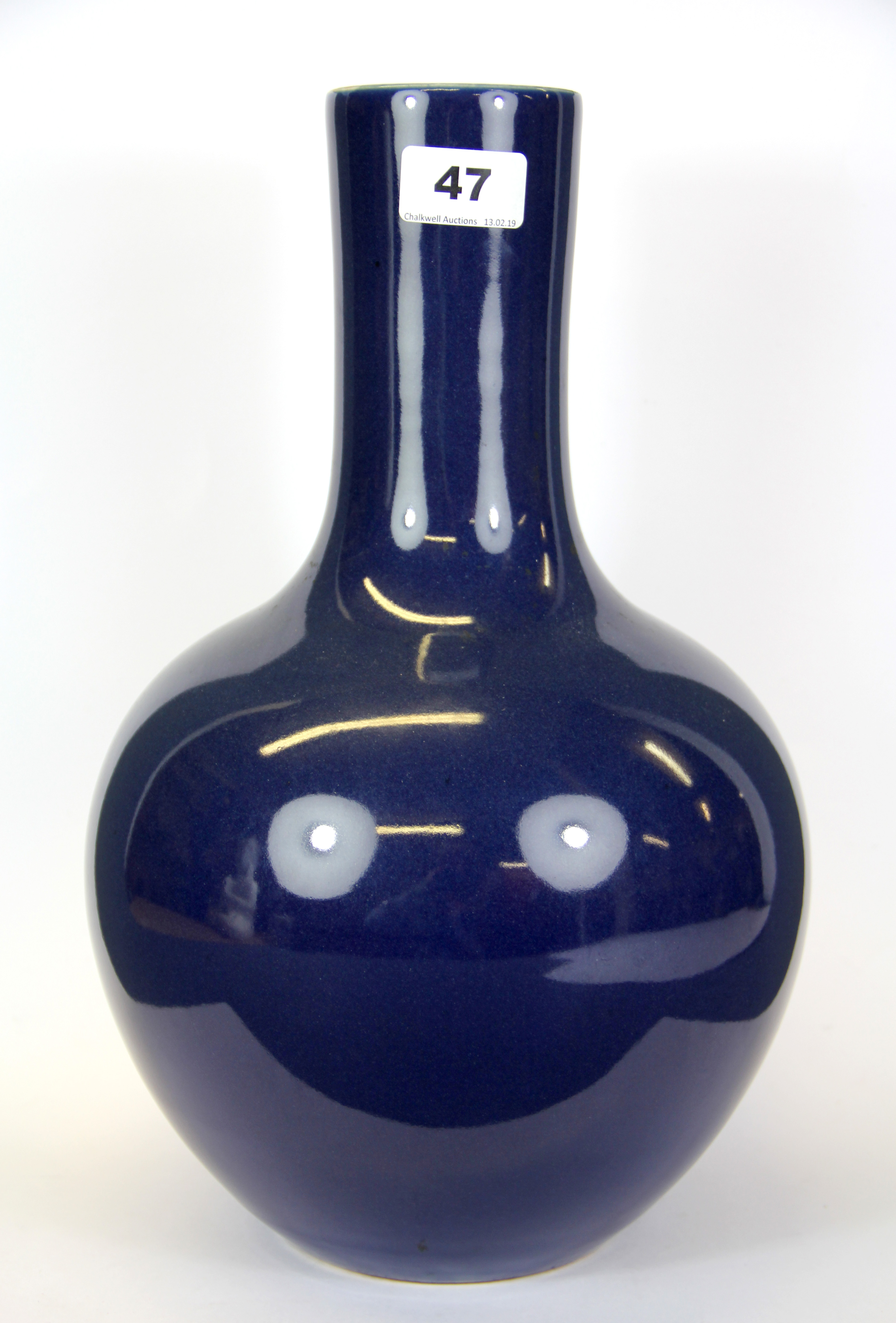 A 19th Century Chinese blue glazed porcelain vase with six character mark to base, H. 36cm.