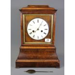 An early 19th Century walnut veneered bracket clock, H. 41cm.