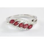 A 925 silver ruby and white stone set ring, (S).