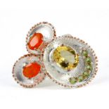 A Hana Maae designer 925 silver gilt ring set with fire opals, citrines and peridots, (M).