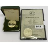 A 1998 Britannia one ounce fine silver coin and a 1972 crown.