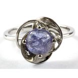 A 925 silver cabochon cut tanzanite set ring, (N.5).